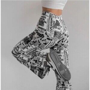 Urban Outfitters Y2K Flare Pants XS Patchwork Newspaper Novelty Stretch Retro